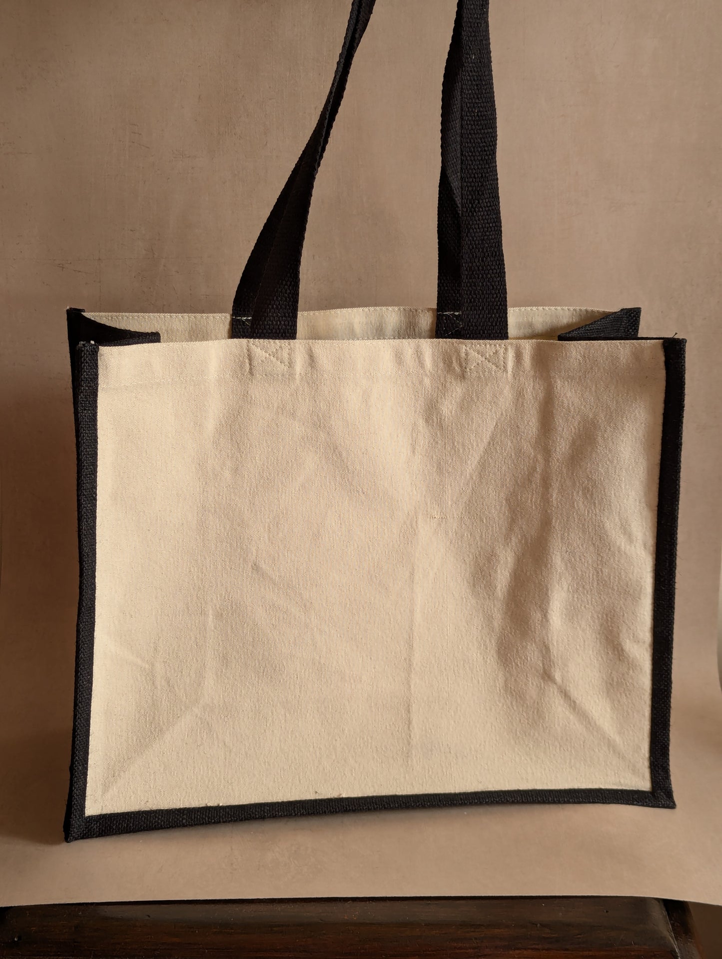 The Antiques Club Jute & Canvas Tote Bag because nothing new is worth the hunt