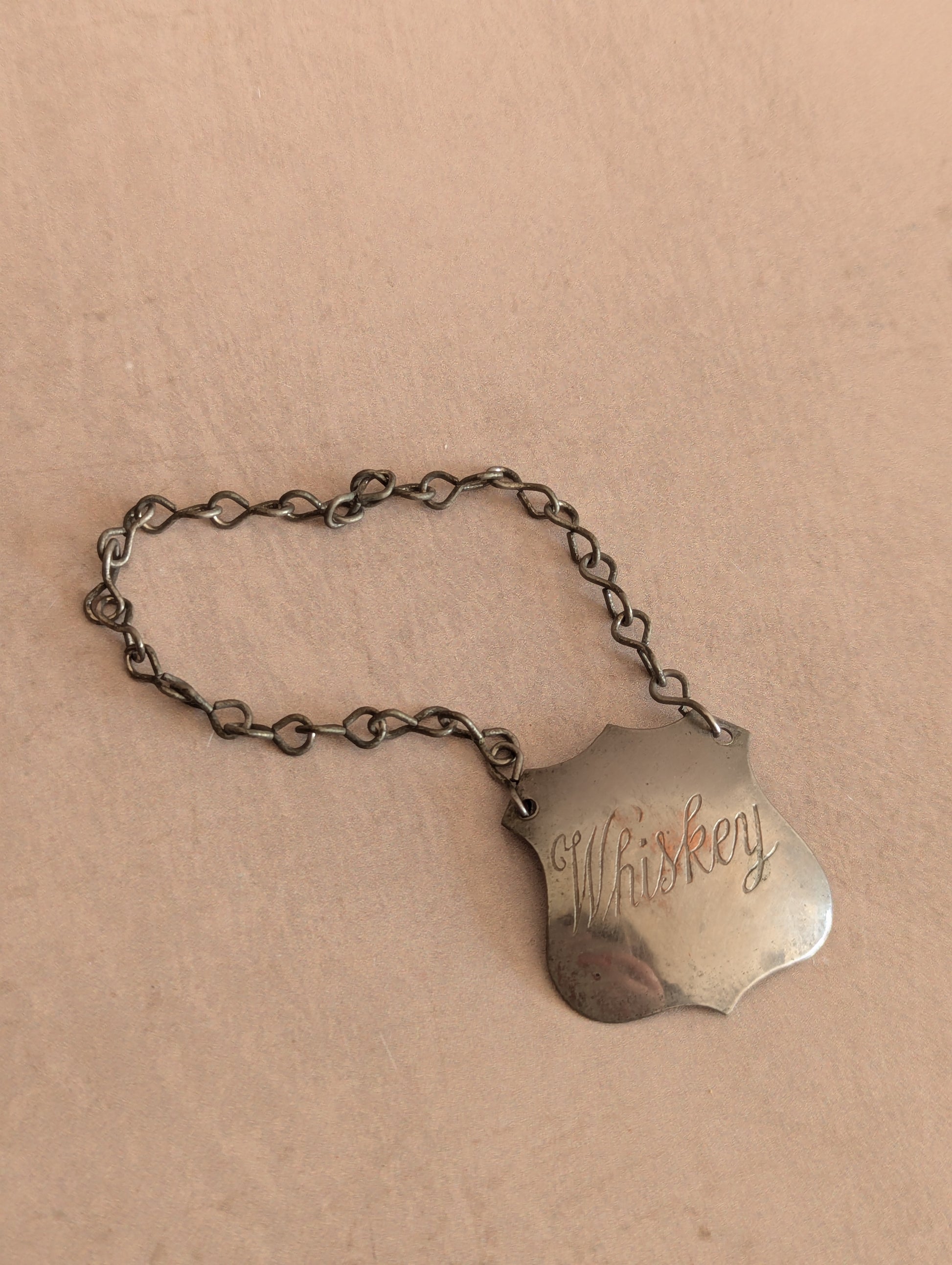 Vintage metal silver-plated shield with chain engraved Whiskey decanter bottle label